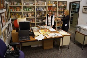 Susan Wakefield, left, corporate archivist at General Mills, talks with Amanda Grayson, a writer in Global Communications. 